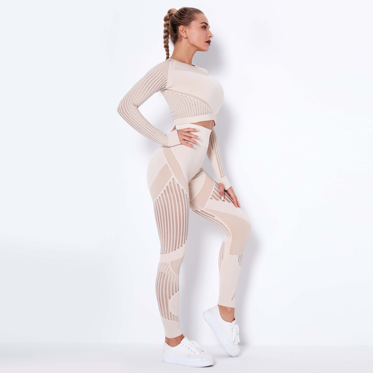 pikywiky beige seamless long sleeve crop top and high-waisted leggings athletic set with mesh detailing on a model