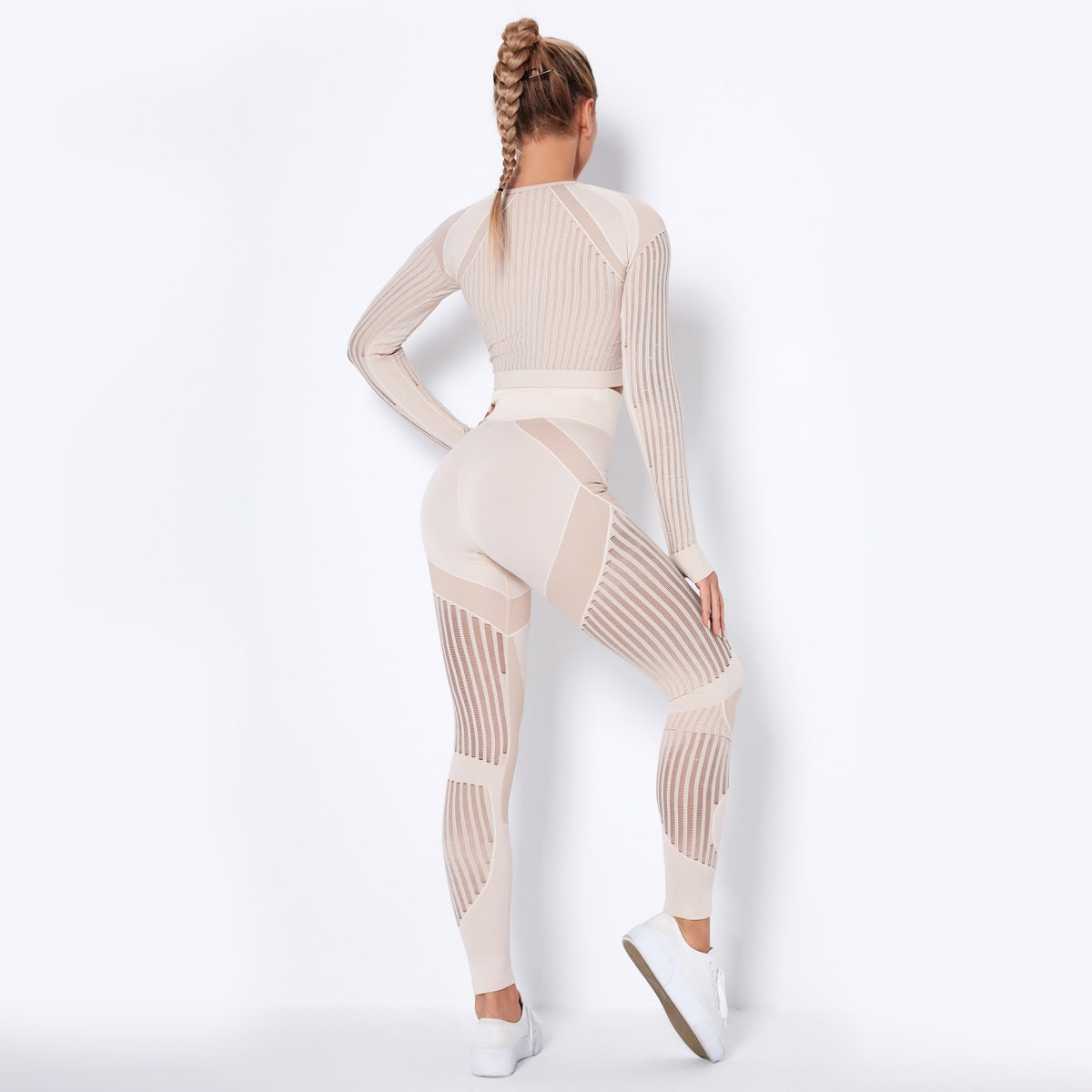 pikywiky beige seamless long sleeve crop top and high-waisted leggings set with mesh detailing on a model