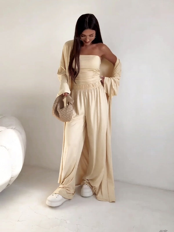 pikywiky beige three-piece lounge set with tube top, wide-leg pants, and long cardigan worn by a woman