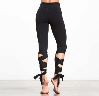 pikywiky black polyester yoga leggings with decorative crisscross bandage ties at the calves for fitness and dance