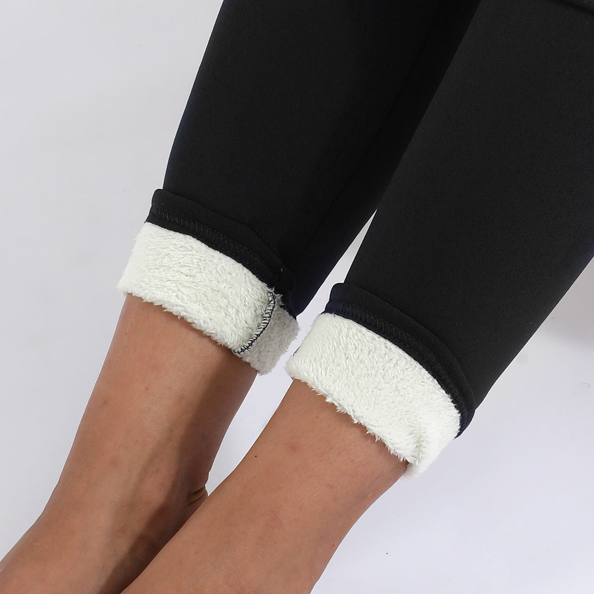 pikywiky black winter leggings with thick white lamb cashmere lining showing a cropped fit