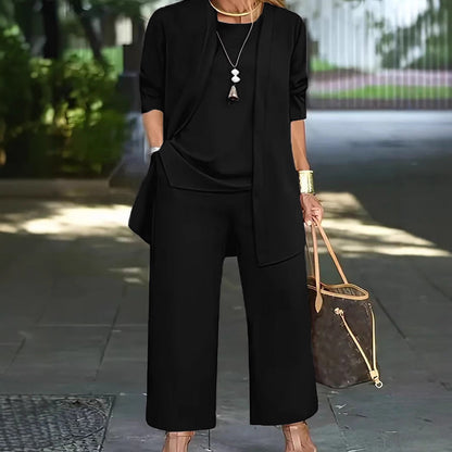 pikywiky black three-piece casual pant set featuring a sleeveless tank, open-front cardigan, and wide-leg trousers.
