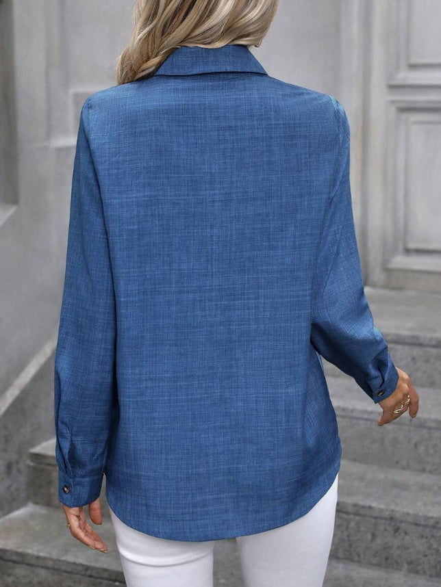 pikywiky blue long-sleeve polyester blouse with a classic collar and textured finish, viewed from the back