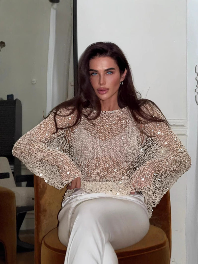 pikywiky open knit long sleeve sweater in champagne with shimmering sequins worn by a model in a relaxed fit