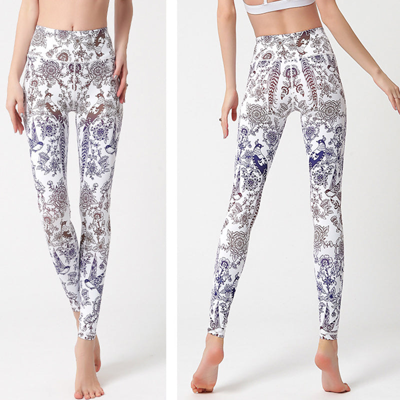 pikywiky high-waisted yoga leggings featuring a white base with intricate blue and brown floral and bird patterns
