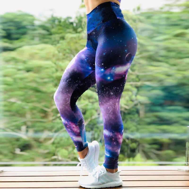 pikywiky high waisted athletic leggings featuring a vibrant purple and blue cosmic galaxy print for yoga or gym