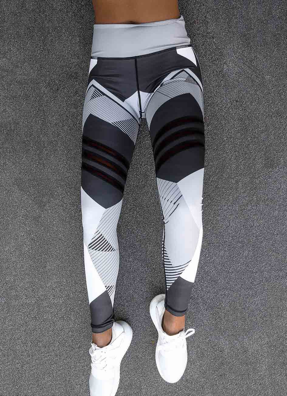 pikywiky high waisted athletic leggings with a grey and white geometric pattern and reflective detailing