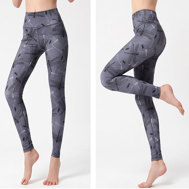 pikywiky high-waisted athletic leggings in grey with a black dragonfly print, featuring a supportive stretch fit.