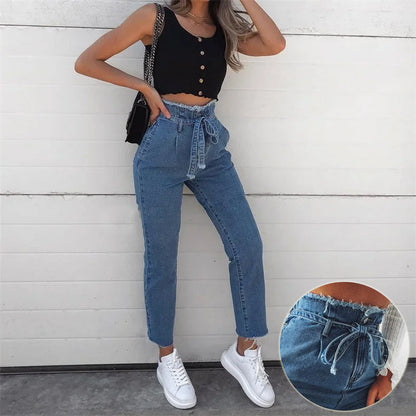 pikywiky high-waisted blue denim jeans with a paperbag tie-waist and raw frayed hem worn with a black crop top