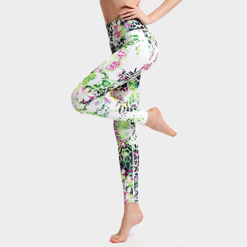 pikywiky high-waisted athletic leggings featuring a vibrant green, pink, and white floral and animal print pattern