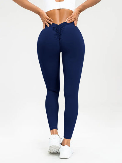 pikywiky high-waisted navy blue athletic leggings with ruched back detailing for a sculpted, lifted fit