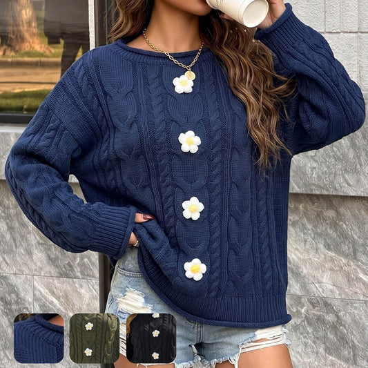 pikywiky navy blue cable knit sweater featuring hand-knitted white crochet flower appliqués and a relaxed fit