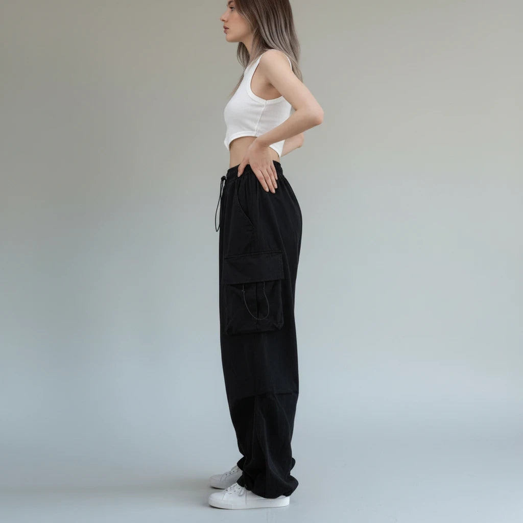 Pikywiky relaxed black cargo pants with drawstring cuffs, side view