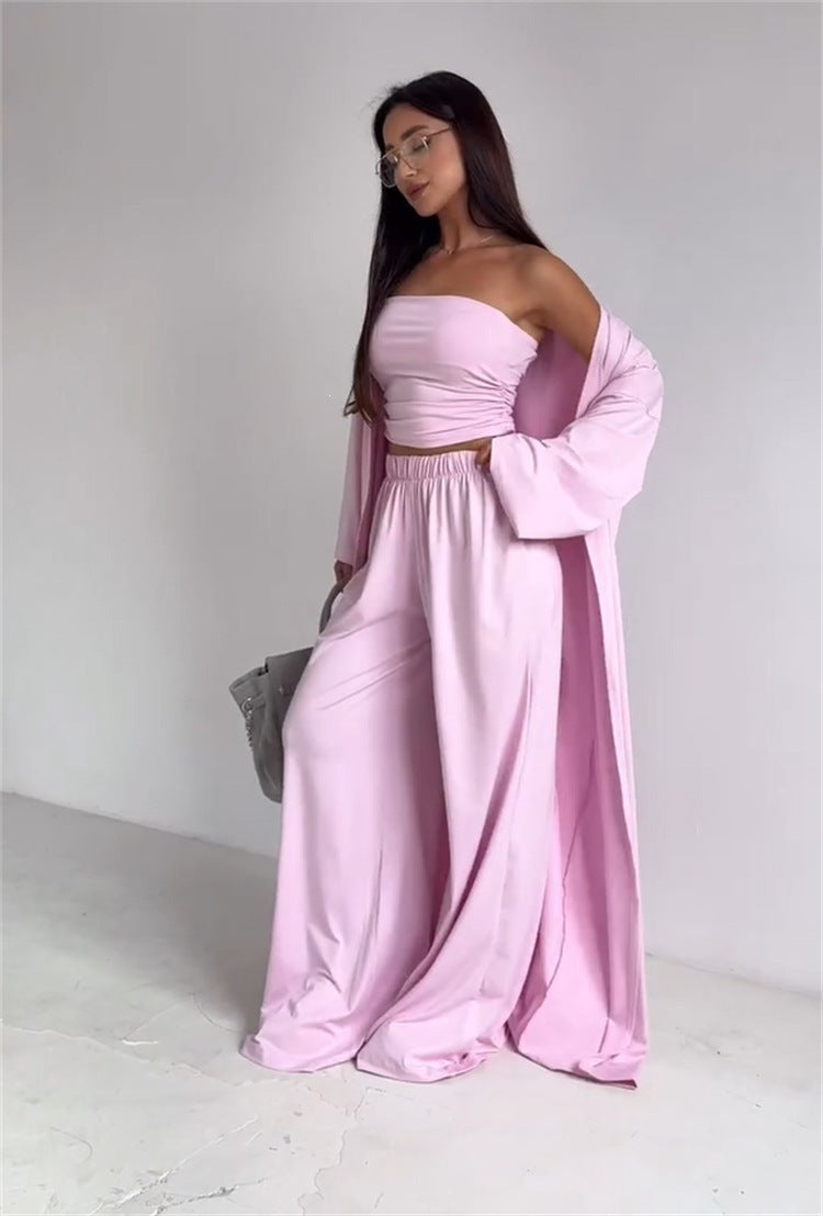 pikywiky three-piece light pink lounge set with a strapless tube top, wide-leg pants, and a matching long cardigan.