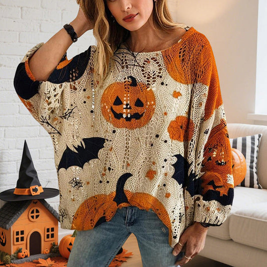 pikywiky loose fit batwing sleeve blouse with orange pumpkin and black bat Halloween print and diamond cutouts