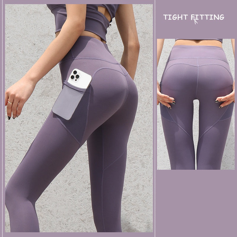 pikywiky high waisted purple athletic leggings with side pockets and sculpting seams worn by a model