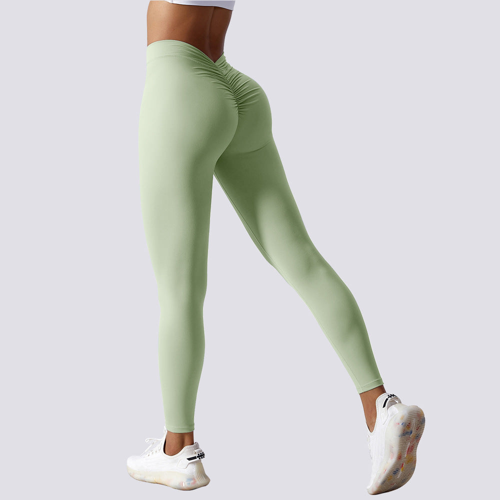 pikywiky high-waisted sage green athletic leggings with ruched back detailing for a sculpted, lifted fit.