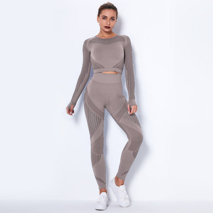pikywiky seamless taupe long sleeve crop top and high-waisted leggings athletic set with mesh detailing on a model