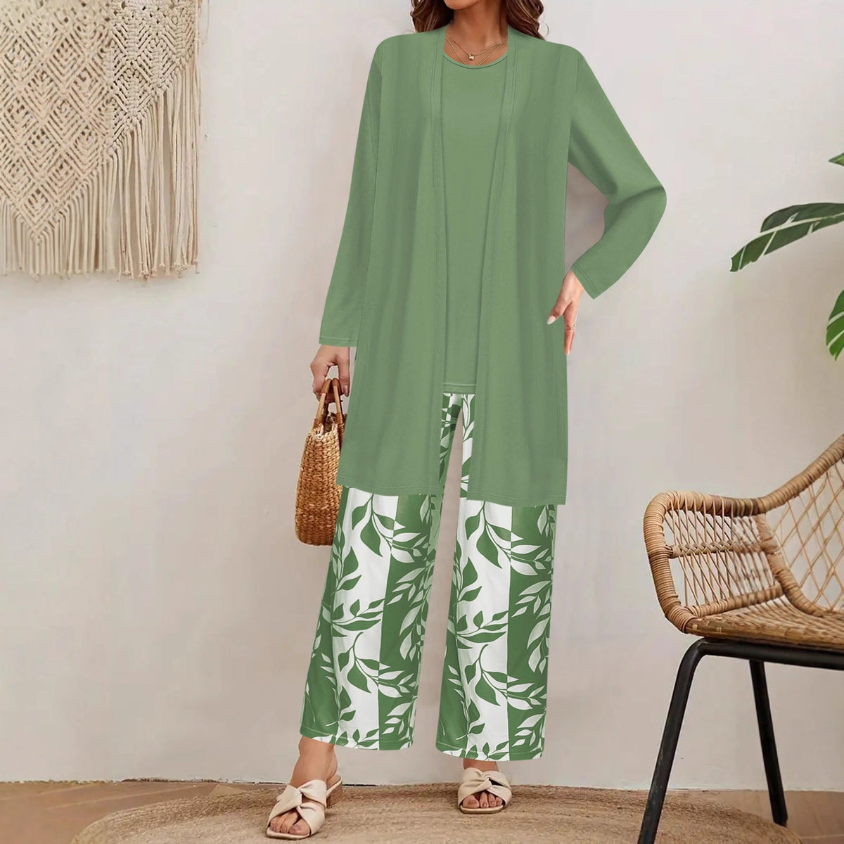 pikywiky three-piece outfit featuring a sage green tank top, long cardigan, and wide-leg pants with a white leaf print.