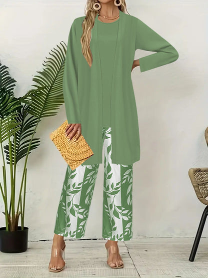 pikywiky three-piece casual outfit featuring a sage green tank top, long cardigan, and leaf-print wide-leg pants.