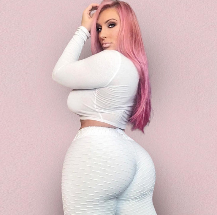 pikywiky white jacquard booty lifting scrunch leggings worn by a model with pink hair