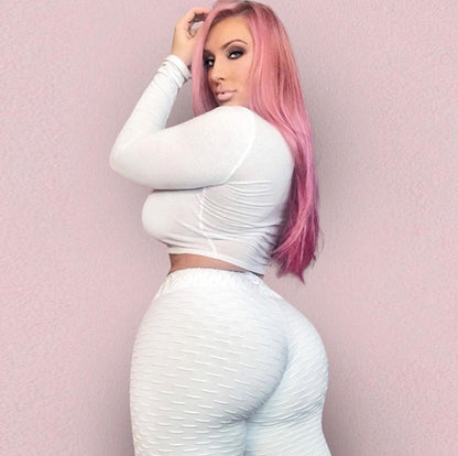 pikywiky white jacquard booty lifting scrunch leggings worn by a model with pink hair